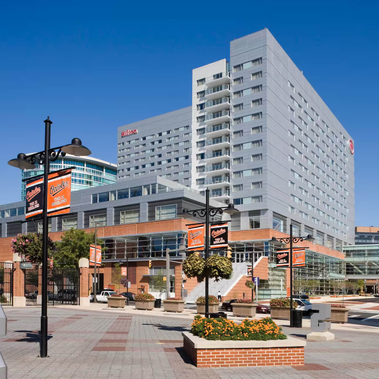 Exterior view of the Hilton Baltimore Inner Harbor from the Orioles' Stadium entrance.